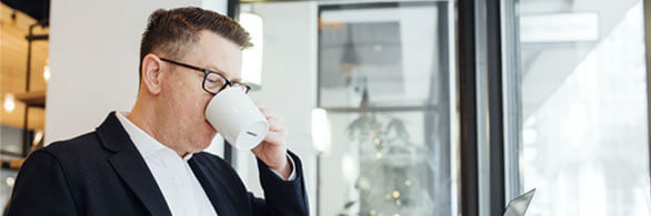 Business professional reviewing cash processing services